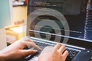 Developing programming and coding technologies on desk white blu