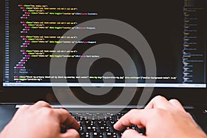 Developing programming and coding technologies on desk white blu