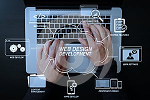 top view of businessman typing keyboard with laptop computer on