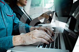 Developing programming and coding technologies working in a software engineers developing applications together in office
