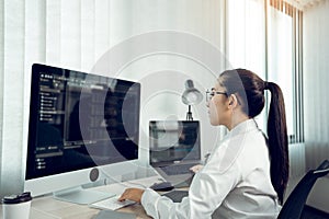 Developing programming and coding technology working in a software engineers developing applications in office