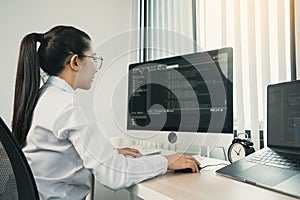 Developing programming and coding technology working in a software engineers developing applications in office