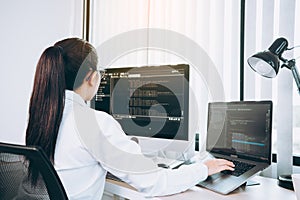 Developing programming and coding technology working in a software engineers developing applications in office