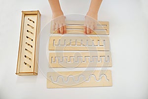 The developing rulers are simulated by Montessori for preschoolers. the concept of preparing a child`s