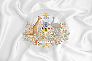 A developing white flag with the coat of arms of Australia. Country symbol. Illustration. Original and simple coat of arms in