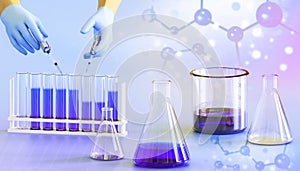 Development and research of laboratory chemicals liquid with the hands of scientists and chemical fluids to test