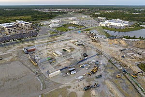 Development of residential housing in US suburbs. Beginning of construction works on prepared ground. Large building photo