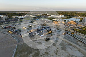 Development of residential housing in US suburbs. Beginning of construction works on prepared ground. Large building photo