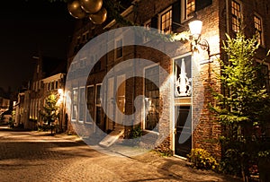 Deventer at night in a Dickens street photo