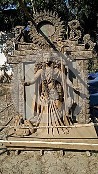 Devi saraswati idol,statue,murti is making by an clay idol maker in Hindu religion, mythology in India.