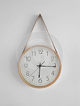 deviant classic clock hanging on a white wall