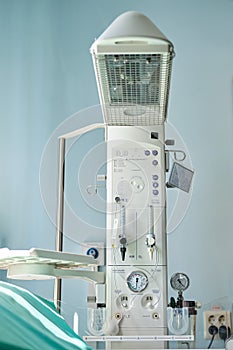 A device for resuscitation of infants and checking the child on the Apgar scale after delivery. Machine for oxygen supply and