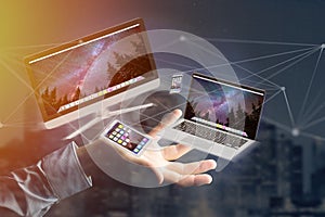 Devices like smartphone, tablet or computer flying over connection network - 3d render