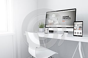 devices on white minimal workspace interior design website