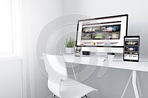 devices on white minimal workspace responsive emagazine website photo