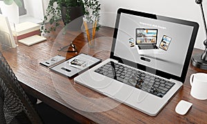 devices on wooden desktop