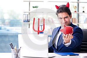 The devil angry businessman in the office