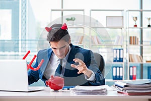 The devil angry businessman in the office