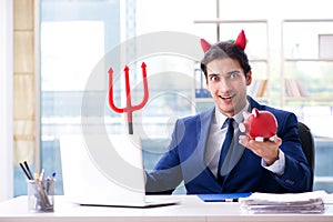 The devil angry businessman in the office