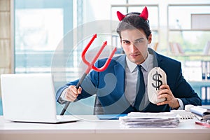 The devil angry businessman in the office
