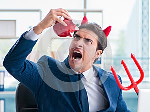 Devil angry businessman in the office