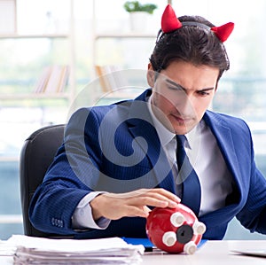 Devil angry businessman in the office