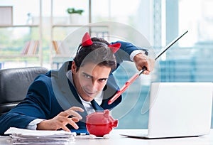 Devil angry businessman in the office