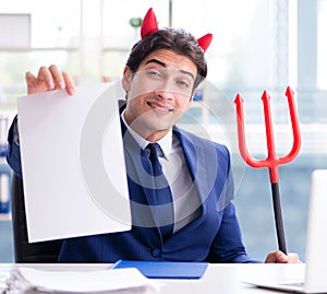 Devil angry businessman in the office