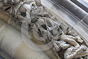 Devil or demon in the relief of the archivolt of the new cathedral of Vitoria Gasteiz photo