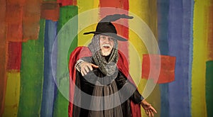 Devil man. Holiday and celebration. Magic hat. Best ideas for Halloween. Halloween party. witch man in hat and cloak