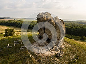 Devil rock in Pidkamin, Lviv region, West Ukraine summer landscape