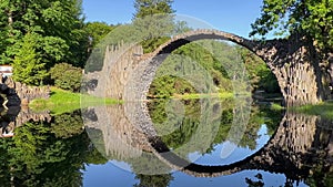 Devil's Bridge Rakotzbrucke in the Rhododendron Palace Landscape Park Kromlau, Lake Rakotz, Saxony, Germany