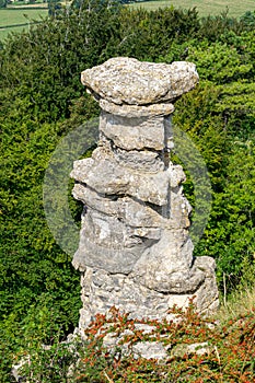 The devil`s chimney rock formation on Leckhampton Hill, Cheltenham