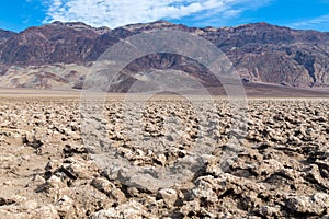 The Devil`s Golf Course and mountains in Death Valley National Park, California, USA