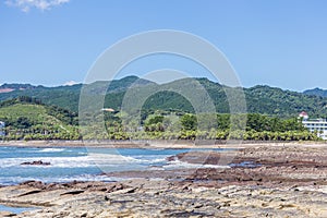 Devil`s Washboard coastline and beach in Aoshima island, Miyazak photo