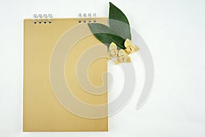 Devil tree and gold calendar with white background