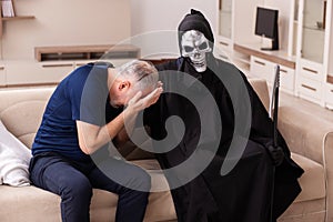 Devil visting old dying man at home