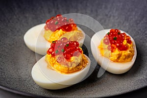 Deviled egg with salmon caviar