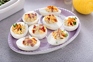 Deviled eggs with bacon and smoked paprika