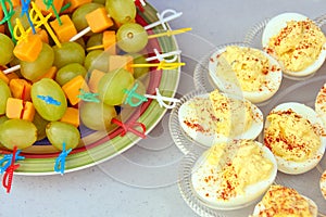 Deviled eggs and grapes appetizer