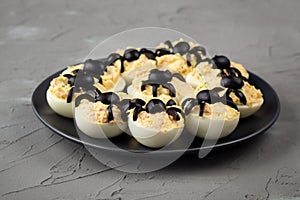 Deviled Eggs With A Spider For Halloween Party