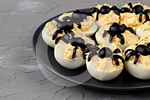 Deviled Eggs With A Spider For Halloween Party