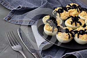 Deviled Eggs With A Spider For Halloween Party