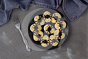 Deviled Eggs With A Spider For Halloween Party