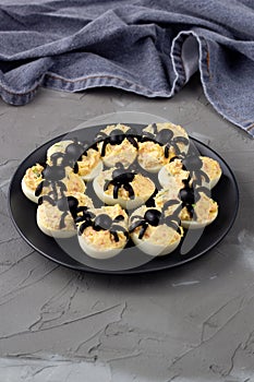 Deviled Eggs With A Spider For Halloween Party