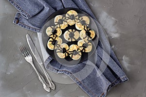 Deviled Eggs With A Spider For Halloween Party