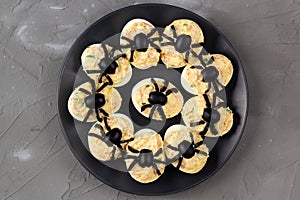 Deviled Eggs With A Spider For Halloween Party