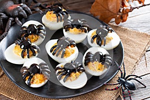 Deviled Eggs With A Spider For Halloween Party. Fun food for kids. Halloween Dish