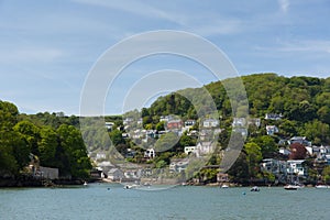 Devon coast view Dartmouth with houses on the hillside and boats