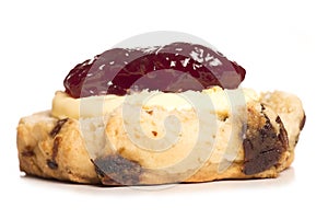 Devon scone with clotted cream on top photo